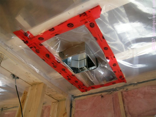 Photo_04: Polyethylene sheet sealed as air barrier around bathroom fan housing