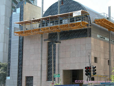 Photo_02: Exterior air barrier using adhered membrane (note the rigid insulation installed on the exterior of the air barrier system)